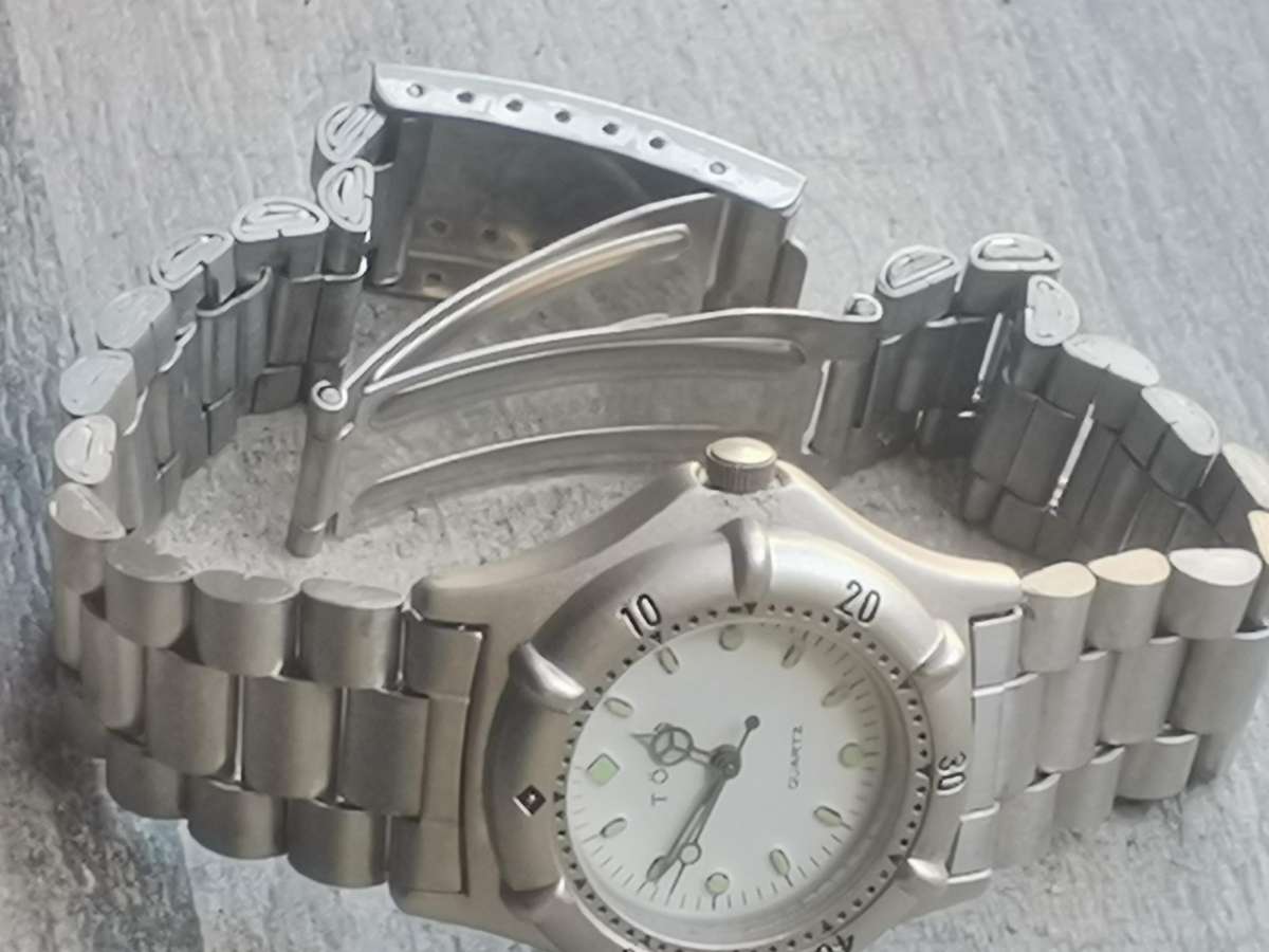 LADIES TORQ STAINLESS STEEL WATCH WITH ROTATING BEZEL IN EXCELLENT WORKING CONDITION