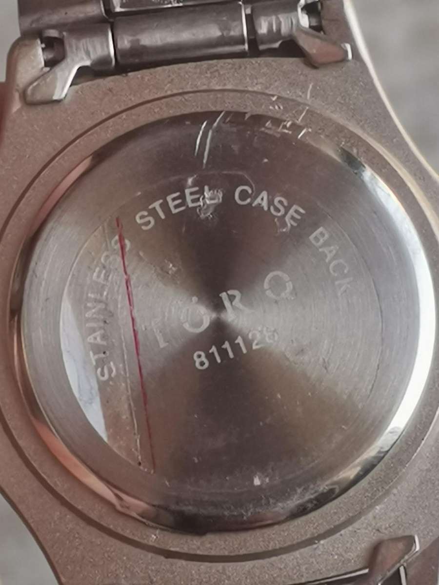 LADIES TORQ STAINLESS STEEL WATCH WITH ROTATING BEZEL IN EXCELLENT WORKING CONDITION