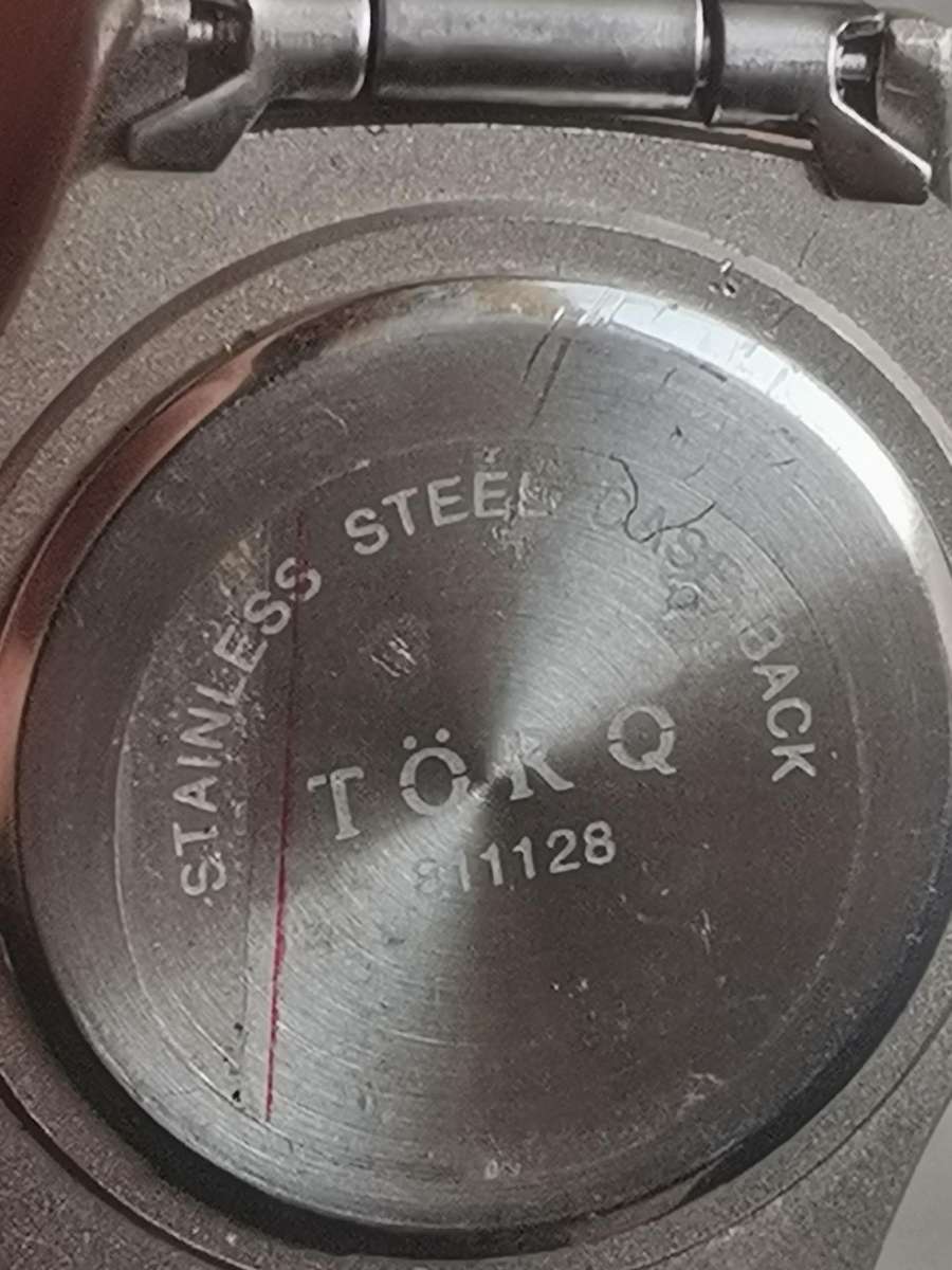 LADIES TORQ STAINLESS STEEL WATCH WITH ROTATING BEZEL IN EXCELLENT WORKING CONDITION