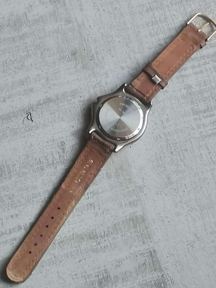 MENS QUARTZ WATCH WITH ROTATING BEZEL IN EXCELLENT WORKING CONDITION