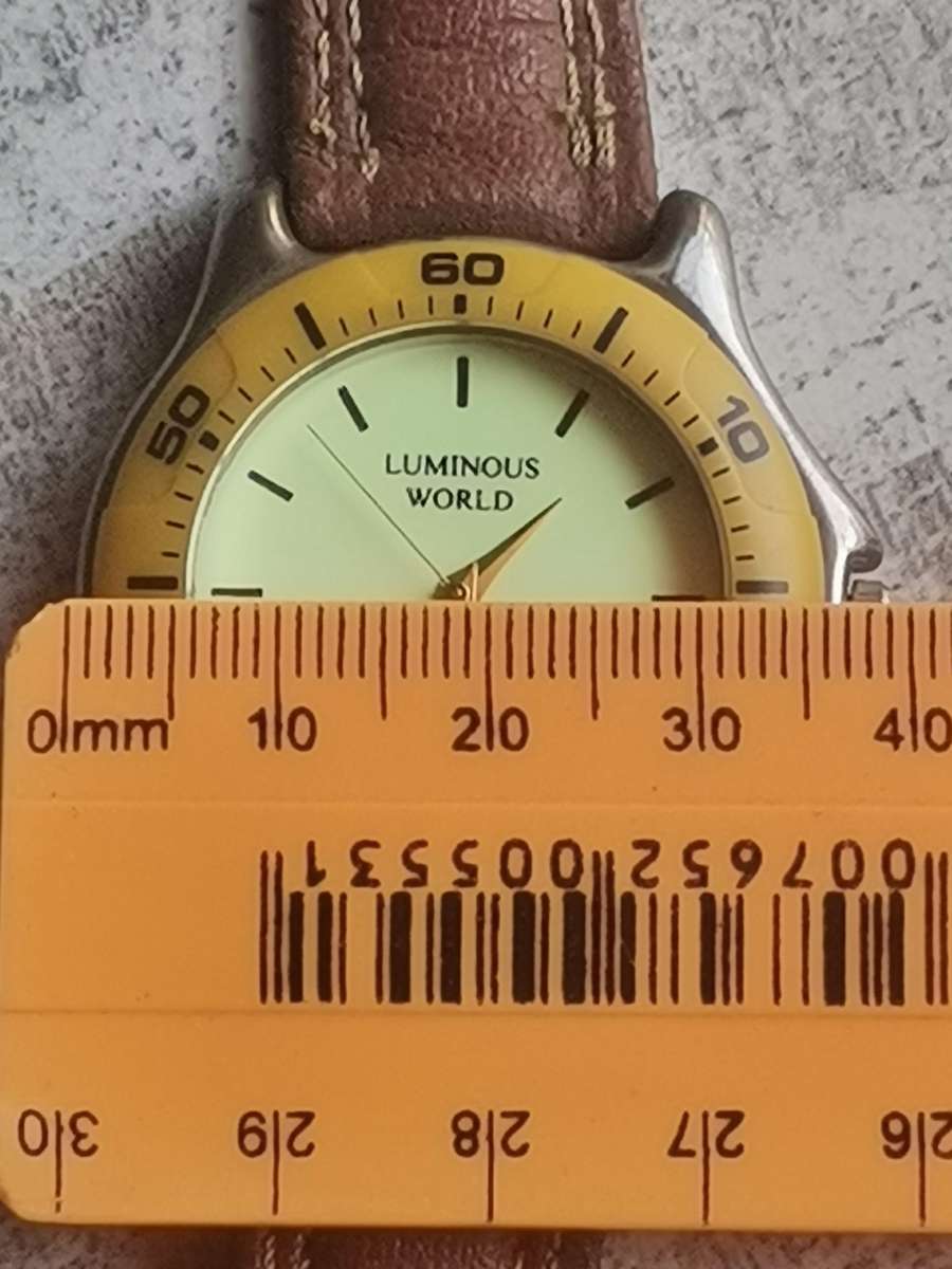 MENS QUARTZ WATCH WITH ROTATING BEZEL IN EXCELLENT WORKING CONDITION