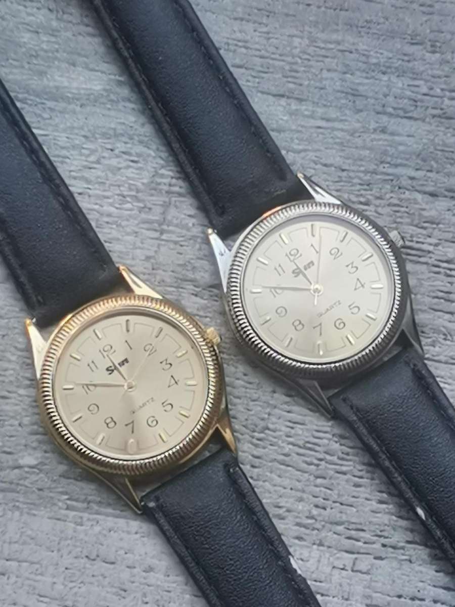 MENS SET OF SUN WATCHES 1 SILVER AND 1 GOLD BOTH IN EXCELLENT WORKING CONDITION - BIDDING FOR BOTH
