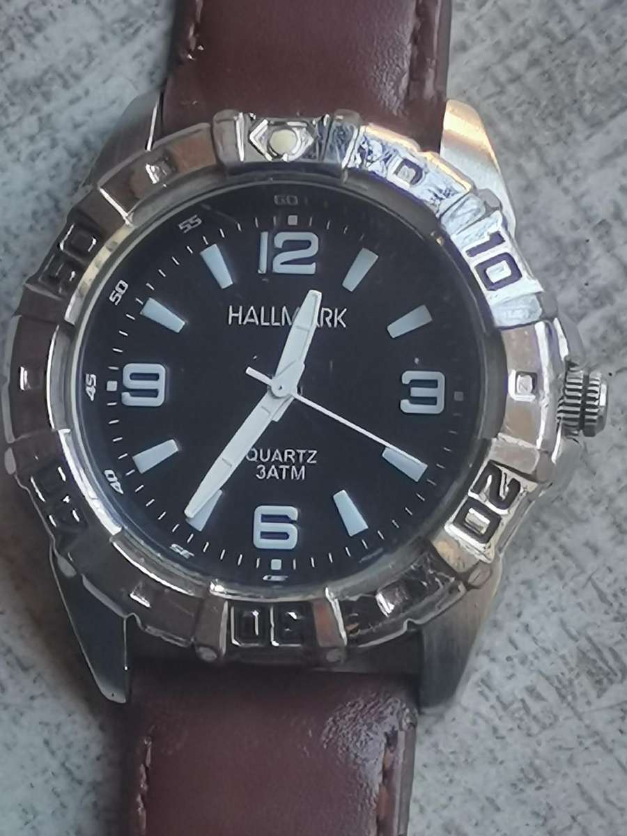 Men's Hallmark watch with rotating bezel