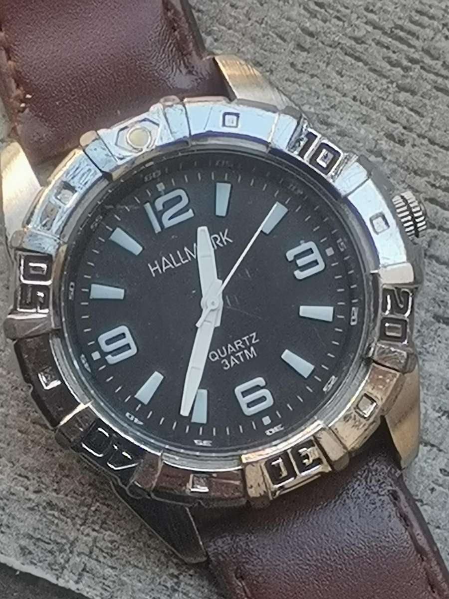 Men's Hallmark watch with rotating bezel