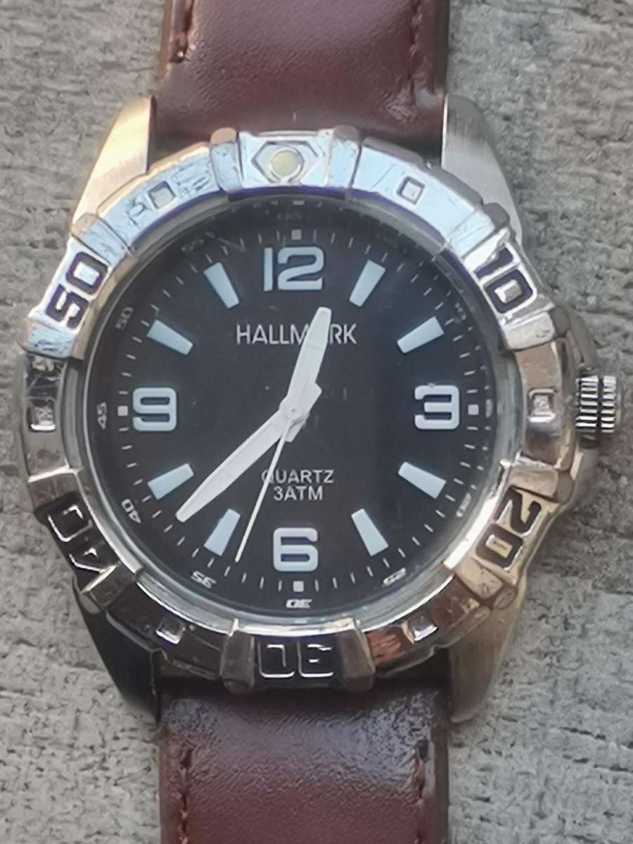 Men's Hallmark watch with rotating bezel