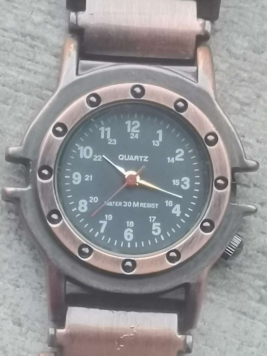 ELEGANT LADIES ALL STEEL BRONZE WATCH IN EXCELLENT WORKING CONDITION