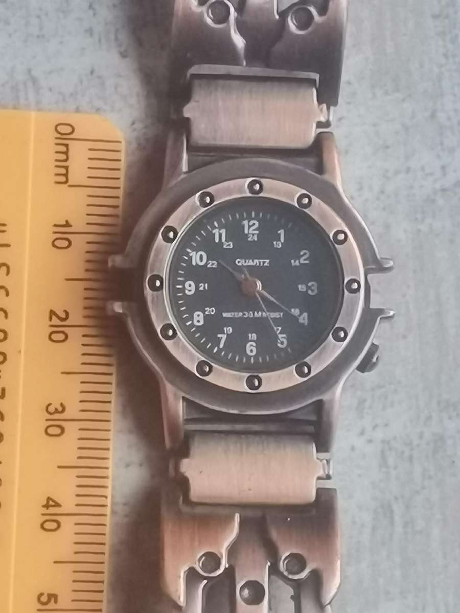 ELEGANT LADIES ALL STEEL BRONZE WATCH IN EXCELLENT WORKING CONDITION