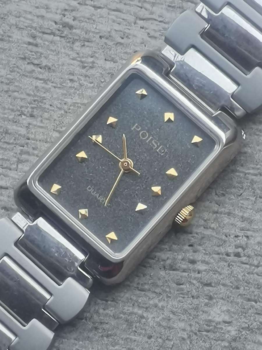 LADIES STAINLESS STEEL POISE WATCH IN EXCELLENT WORKING CONDITION
