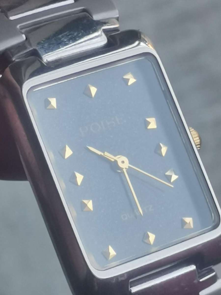 LADIES STAINLESS STEEL POISE WATCH IN EXCELLENT WORKING CONDITION