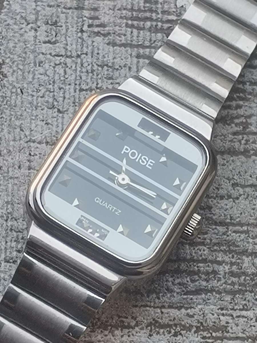 LADIES POISE STAINLESS STEEL WATCH IN EXCELLENT WORKING CONDITION