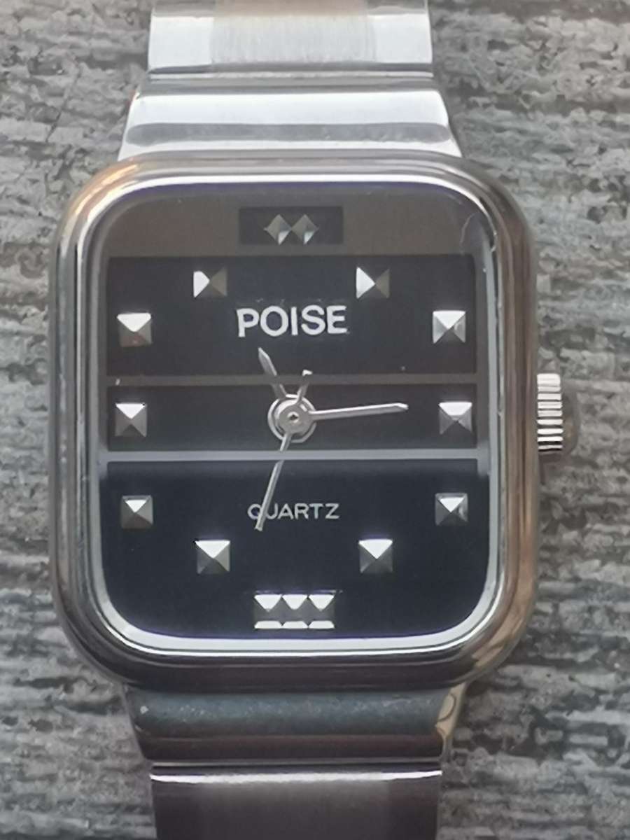 LADIES POISE STAINLESS STEEL WATCH IN EXCELLENT WORKING CONDITION