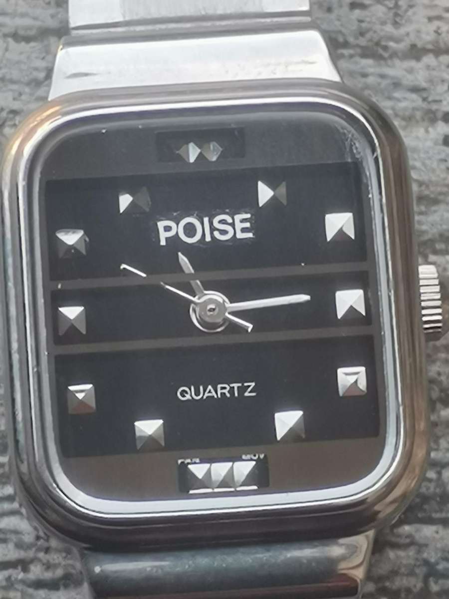 LADIES POISE STAINLESS STEEL WATCH IN EXCELLENT WORKING CONDITION