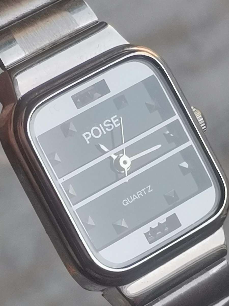 LADIES POISE STAINLESS STEEL WATCH IN EXCELLENT WORKING CONDITION