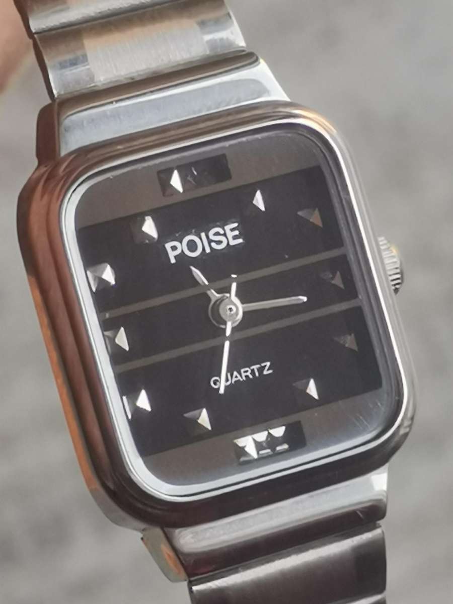LADIES POISE STAINLESS STEEL WATCH IN EXCELLENT WORKING CONDITION