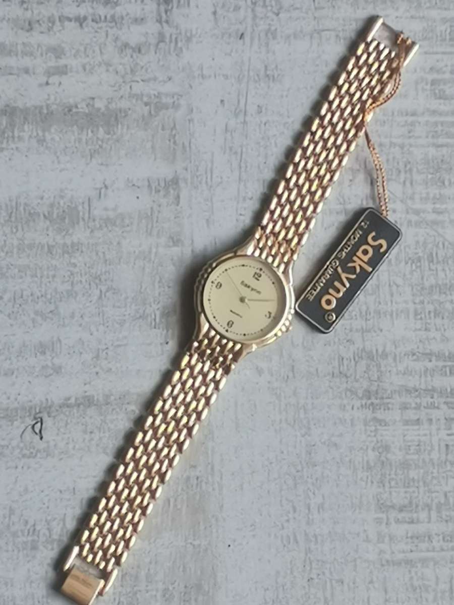 MENS VINTAGE SAKYNO ALL GOLD PLATED WATCH IN EXCELLENT WORKING CONDITION - NEW OLD STOCK