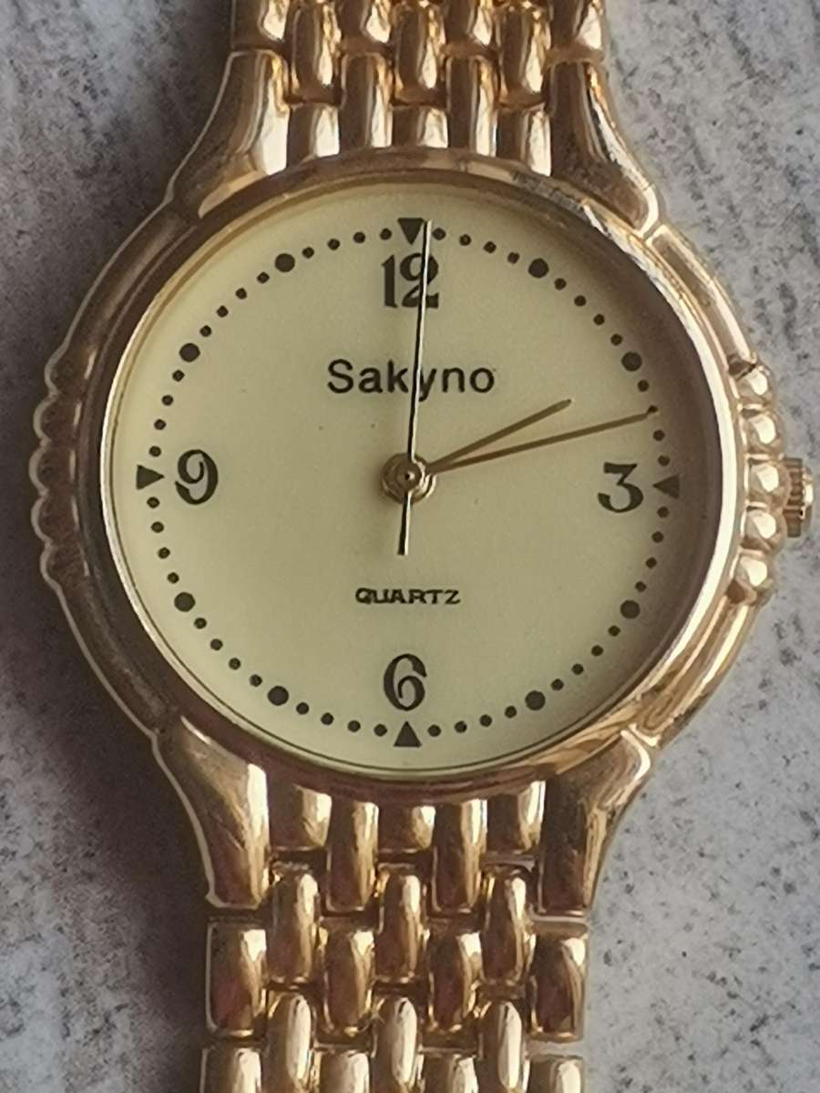 MENS VINTAGE SAKYNO ALL GOLD PLATED WATCH IN EXCELLENT WORKING CONDITION - NEW OLD STOCK