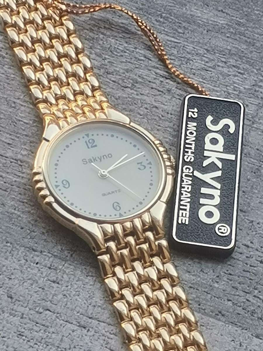 MENS VINTAGE SAKYNO ALL GOLD PLATED WATCH IN EXCELLENT WORKING CONDITION - NEW OLD STOCK