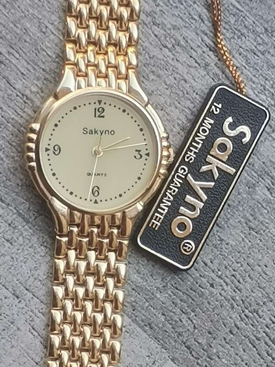 MENS VINTAGE SAKYNO ALL GOLD PLATED WATCH IN EXCELLENT WORKING CONDITION - NEW OLD STOCK