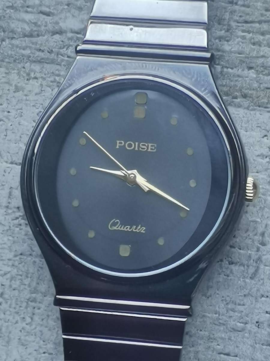LADIES POISE ALL BLACK STAINLESS STEEL WATCH IN EXCELLENT WORKING CONDITION