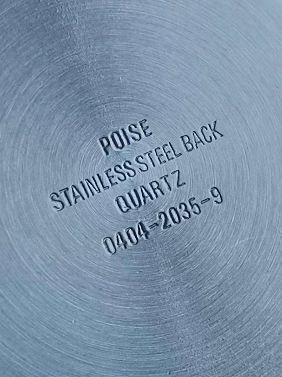 LADIES POISE ALL BLACK STAINLESS STEEL WATCH IN EXCELLENT WORKING CONDITION