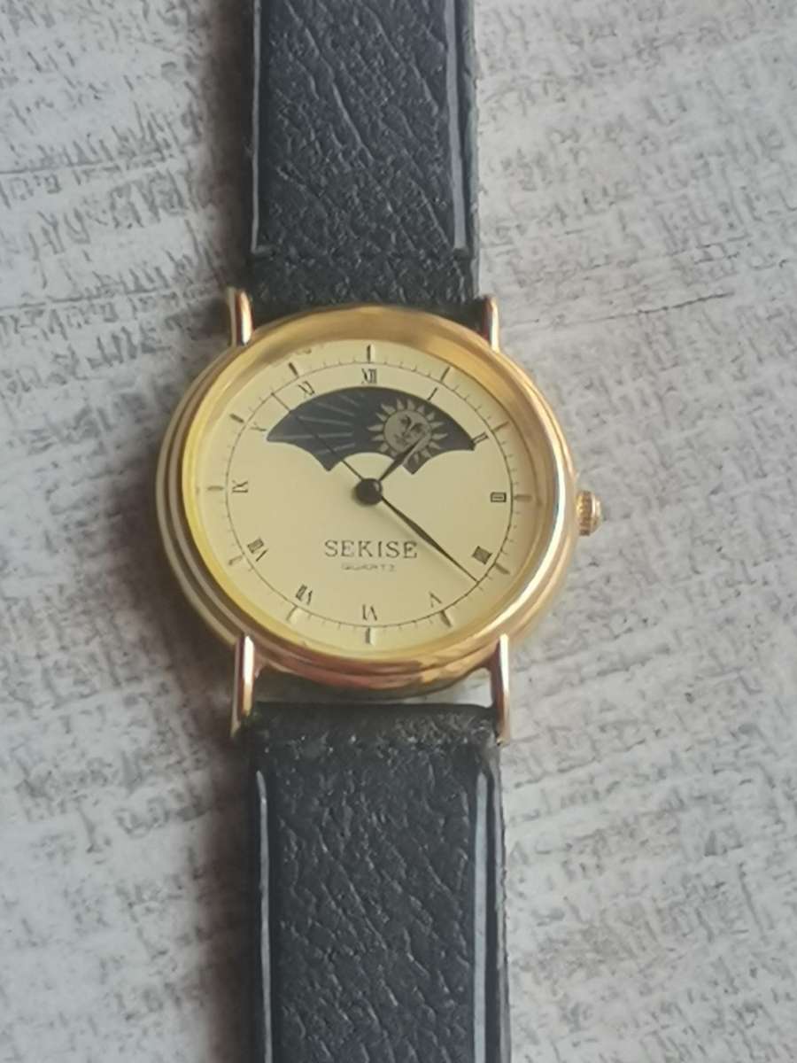 ELEGANT LADIES SEKISE SUN AND MOON WATCH IN EXCELLENT WORKING CONDITION