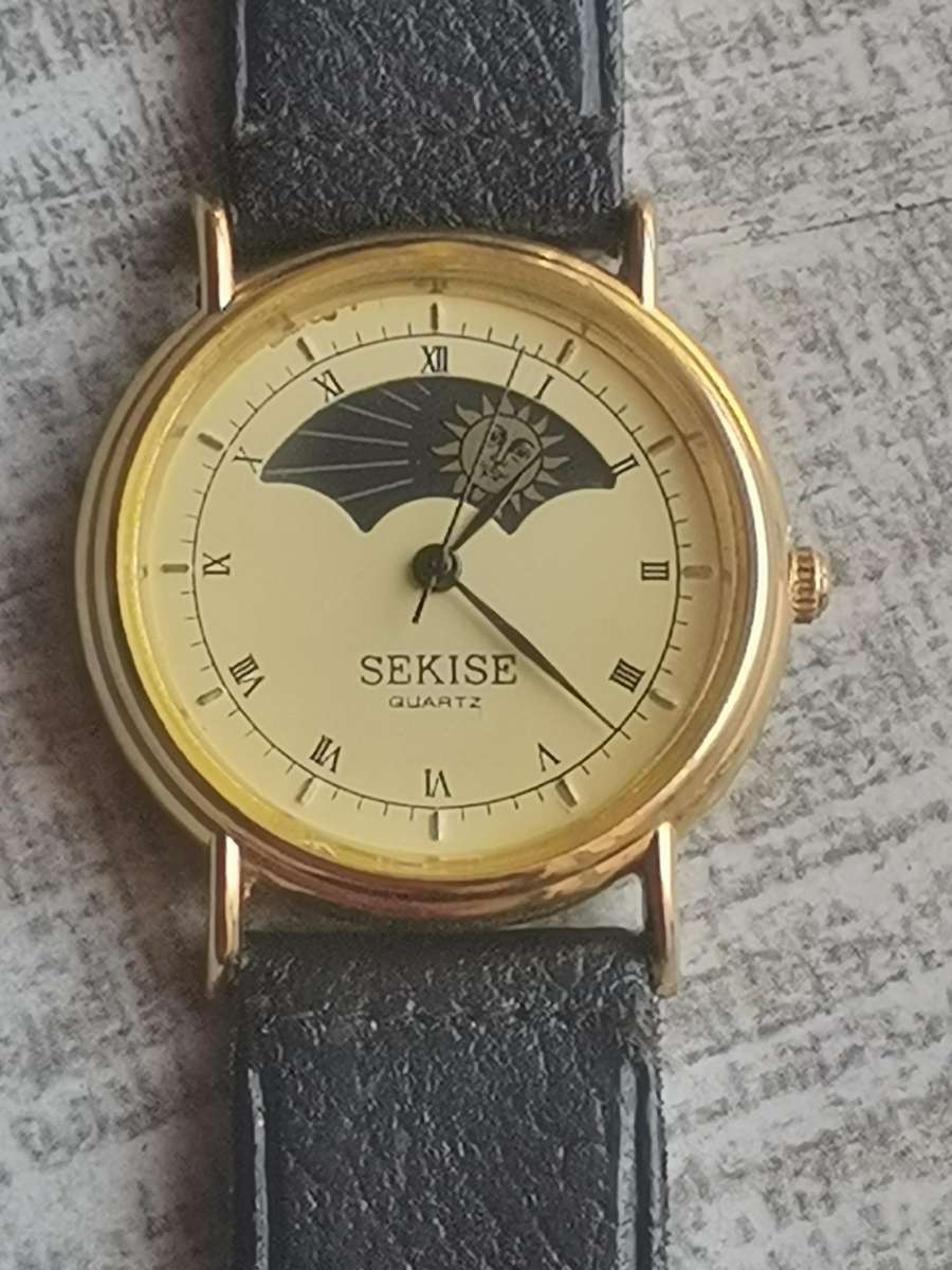 ELEGANT LADIES SEKISE SUN AND MOON WATCH IN EXCELLENT WORKING CONDITION