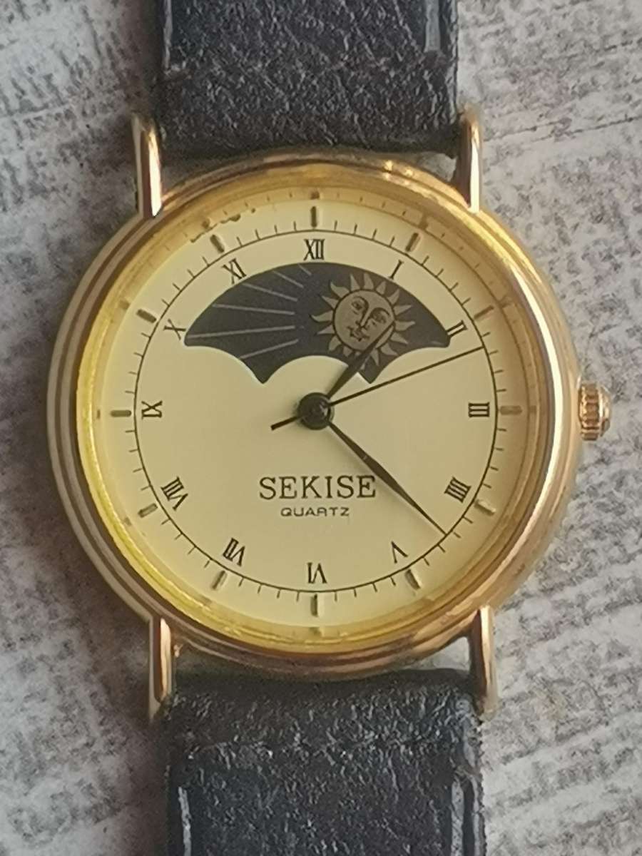 ELEGANT LADIES SEKISE SUN AND MOON WATCH IN EXCELLENT WORKING CONDITION