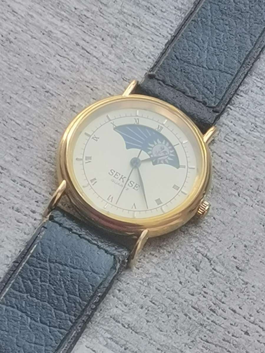ELEGANT LADIES SEKISE SUN AND MOON WATCH IN EXCELLENT WORKING CONDITION