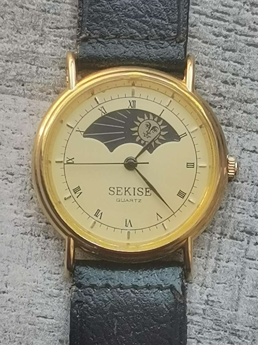 ELEGANT LADIES SEKISE SUN AND MOON WATCH IN EXCELLENT WORKING CONDITION