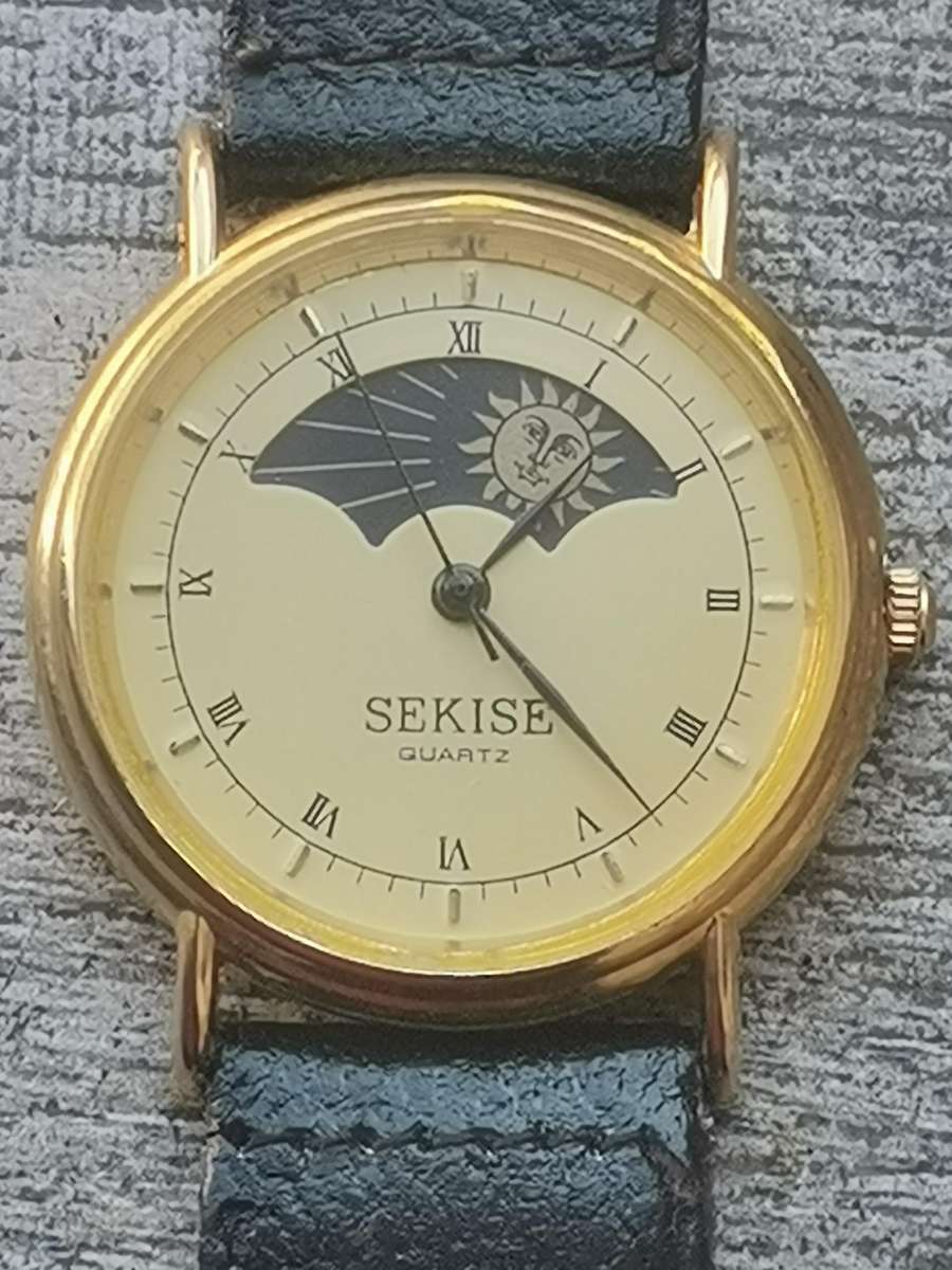 ELEGANT LADIES SEKISE SUN AND MOON WATCH IN EXCELLENT WORKING CONDITION