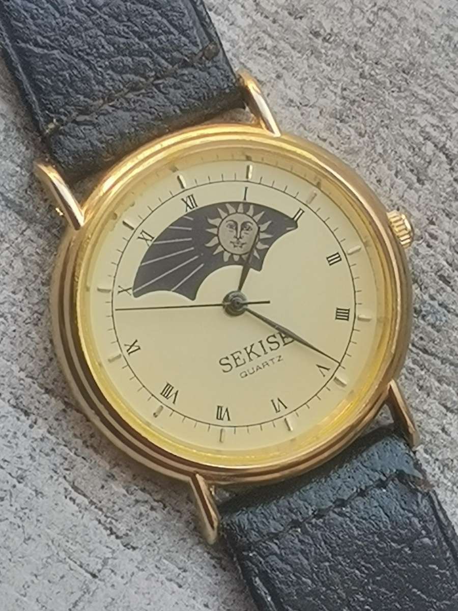 ELEGANT LADIES SEKISE SUN AND MOON WATCH IN EXCELLENT WORKING CONDITION