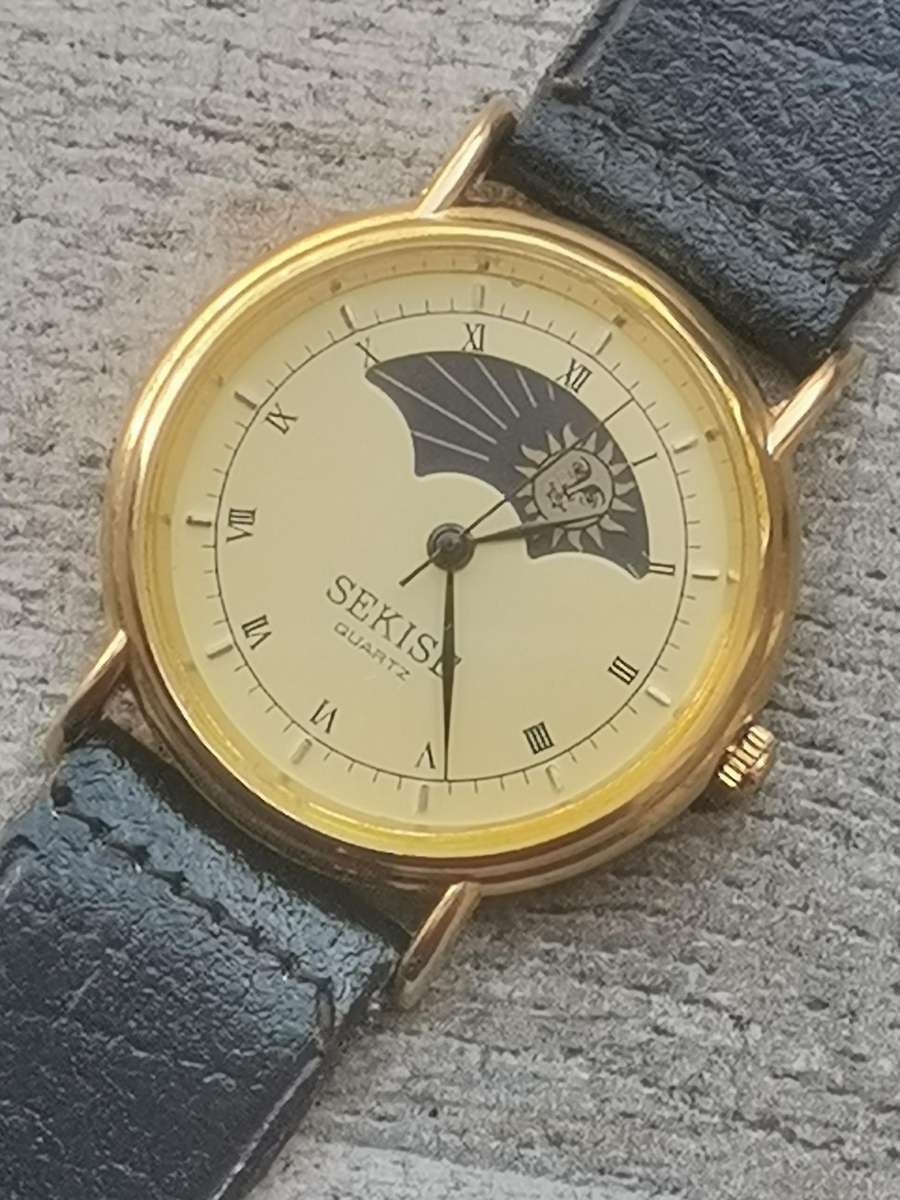 ELEGANT LADIES SEKISE SUN AND MOON WATCH IN EXCELLENT WORKING CONDITION