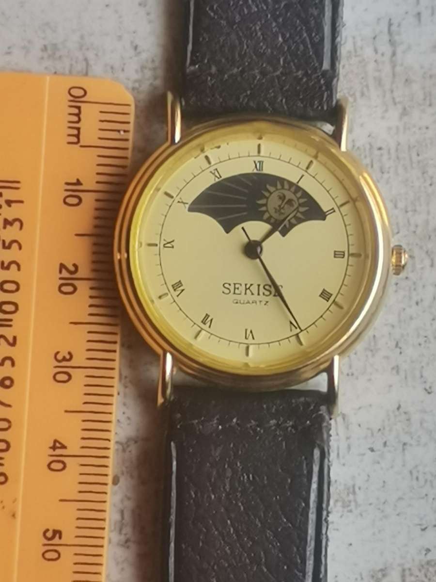 ELEGANT LADIES SEKISE SUN AND MOON WATCH IN EXCELLENT WORKING CONDITION