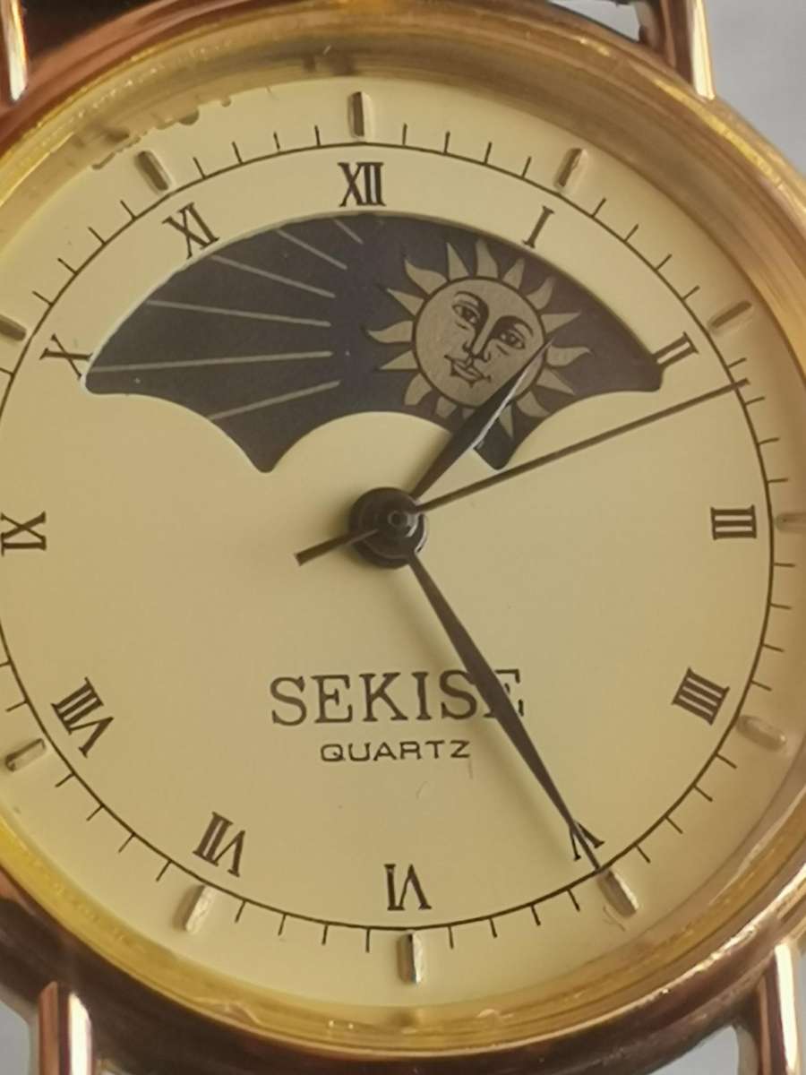 ELEGANT LADIES SEKISE SUN AND MOON WATCH IN EXCELLENT WORKING CONDITION