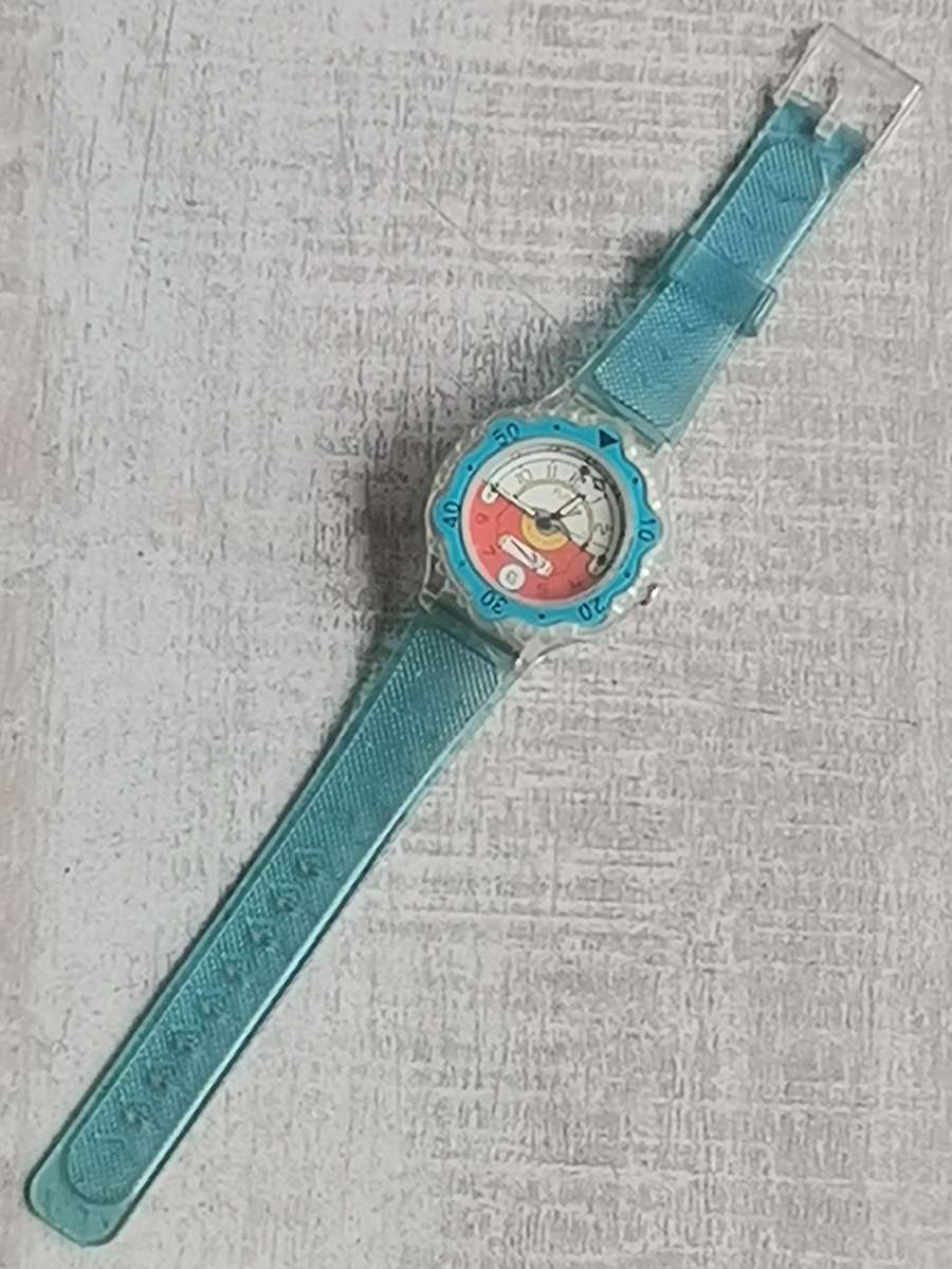 MENS VINTAGE FLASH WATCH WITH SEE-THROUGH BACK IN EXCELLENT WORKING CONDITION