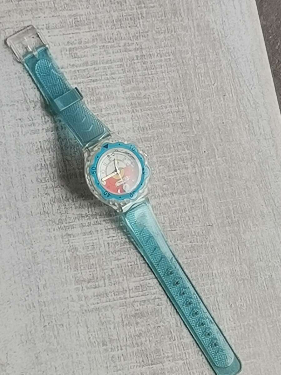 MENS VINTAGE FLASH WATCH WITH SEE-THROUGH BACK IN EXCELLENT WORKING CONDITION