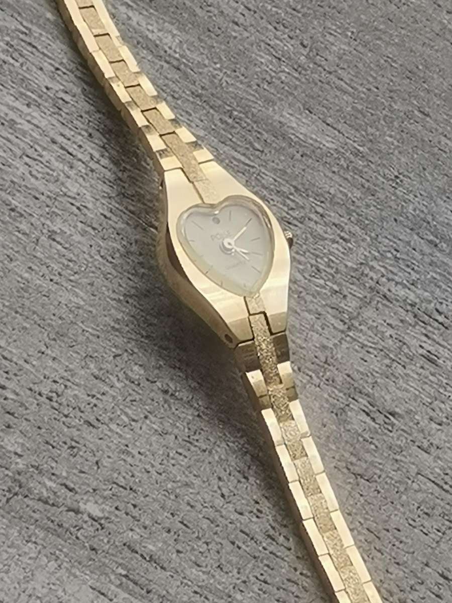 LADIES POISE HEART SHAPED GOLD WATCH IN EXCELLENT WORKING CONDITION