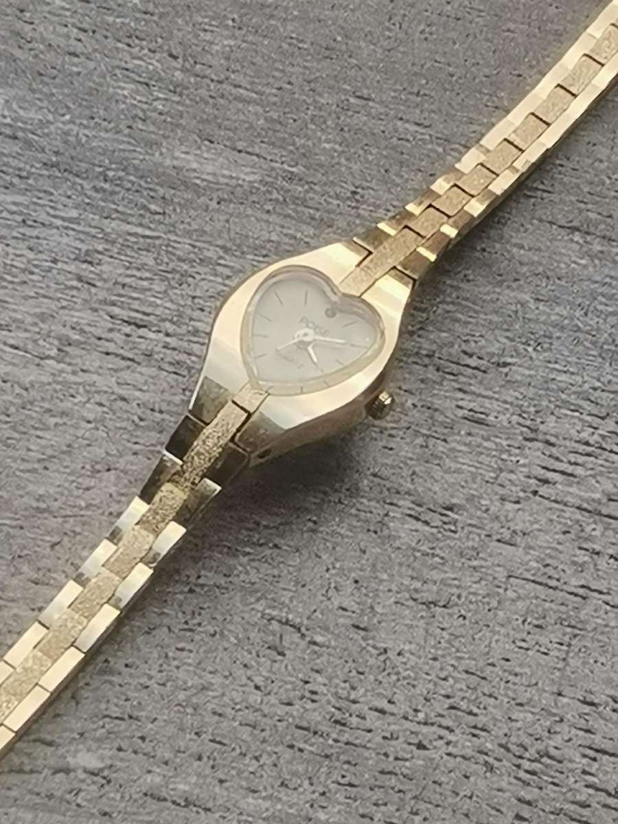 LADIES POISE HEART SHAPED GOLD WATCH IN EXCELLENT WORKING CONDITION