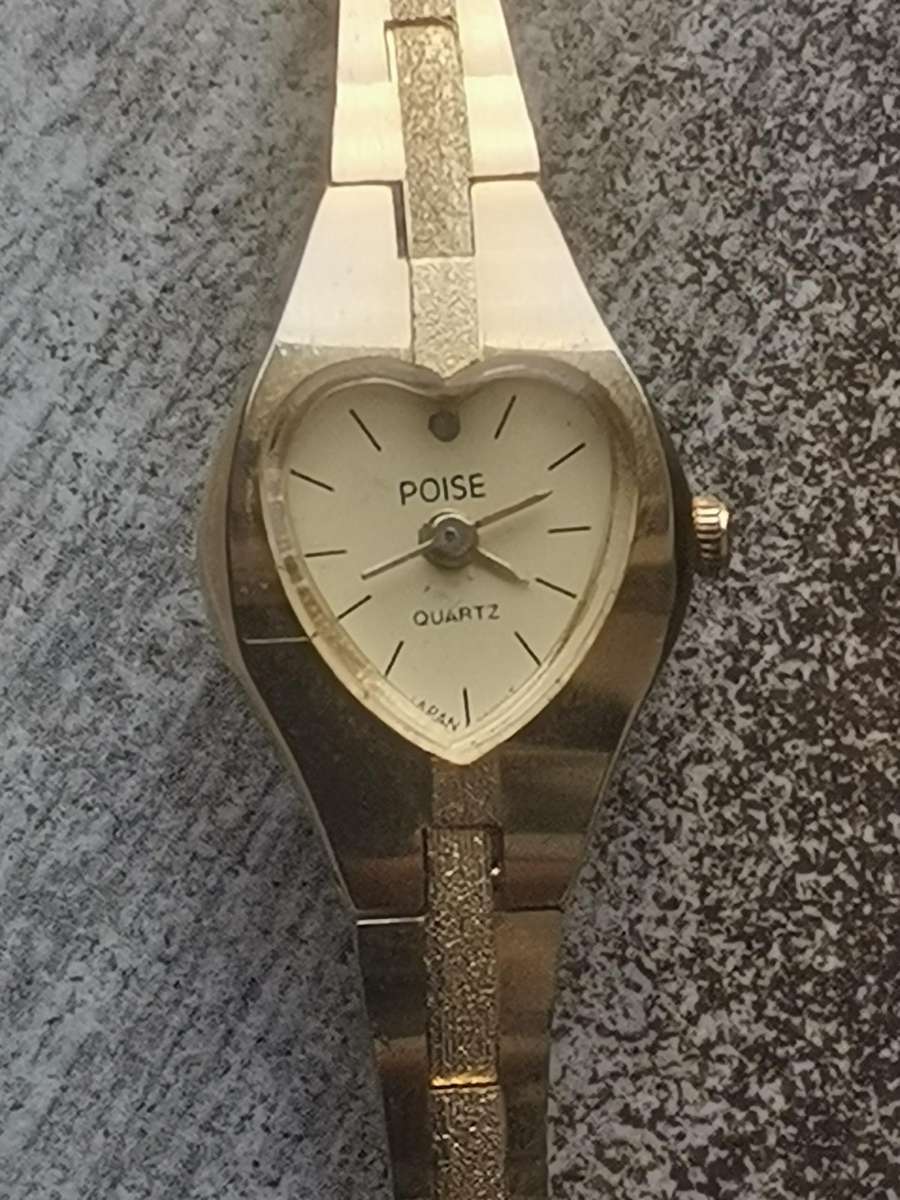 LADIES POISE HEART SHAPED GOLD WATCH IN EXCELLENT WORKING CONDITION