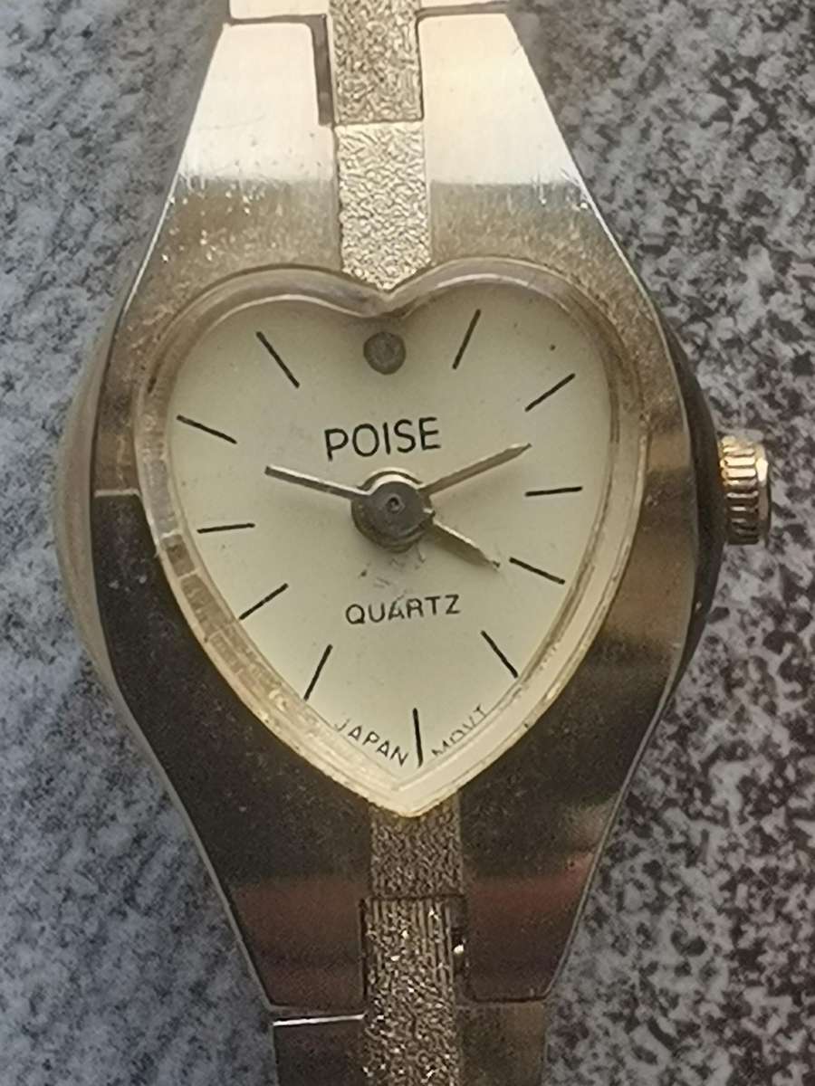 LADIES POISE HEART SHAPED GOLD WATCH IN EXCELLENT WORKING CONDITION