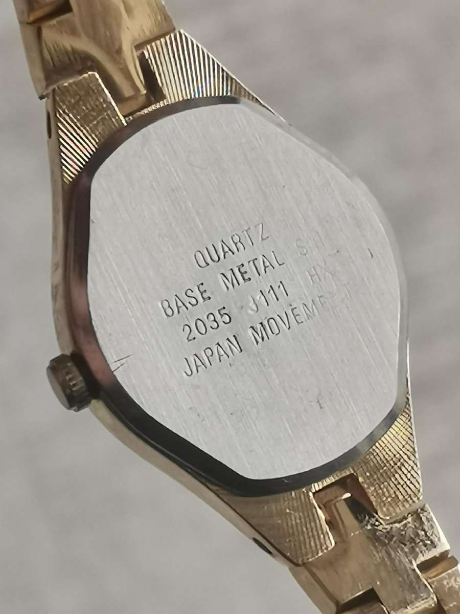 LADIES POISE HEART SHAPED GOLD WATCH IN EXCELLENT WORKING CONDITION