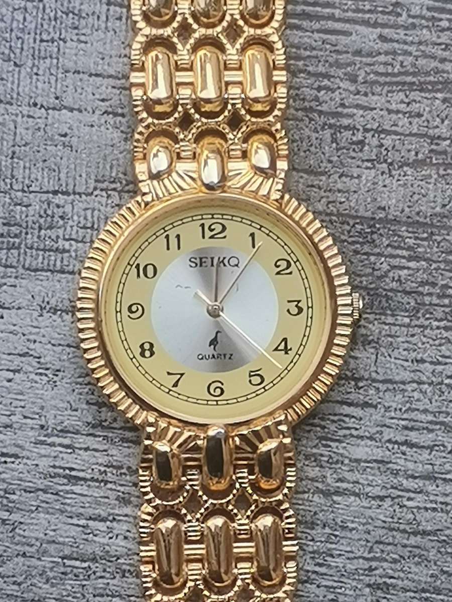 MENS SEIKQ GOLD WATCH IN EXCELLENT WORKING CONDITION