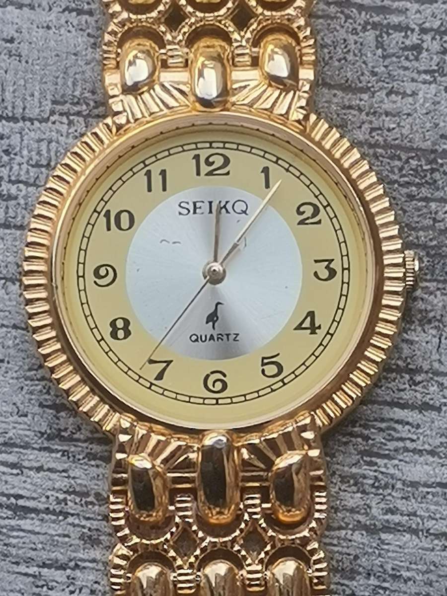 MENS SEIKQ GOLD WATCH IN EXCELLENT WORKING CONDITION