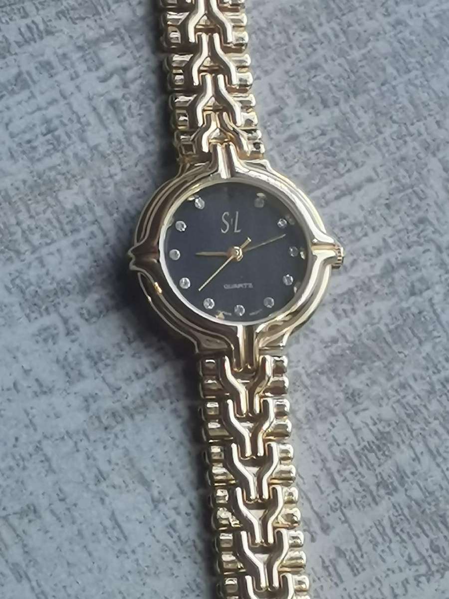 LADIES STL 18K GOLD PLATED WATCH IN EXCELLENT WORKING CONDITION