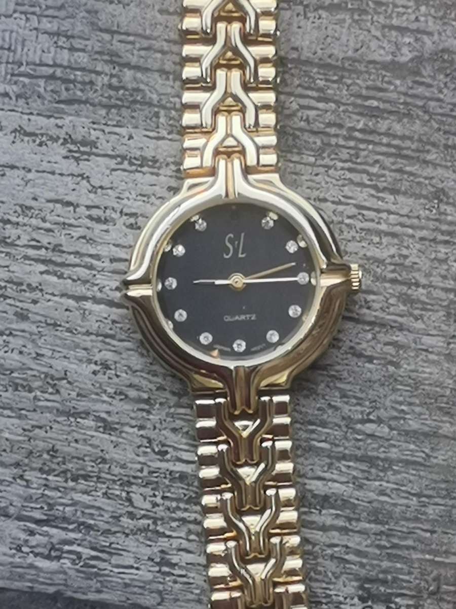 LADIES STL 18K GOLD PLATED WATCH IN EXCELLENT WORKING CONDITION