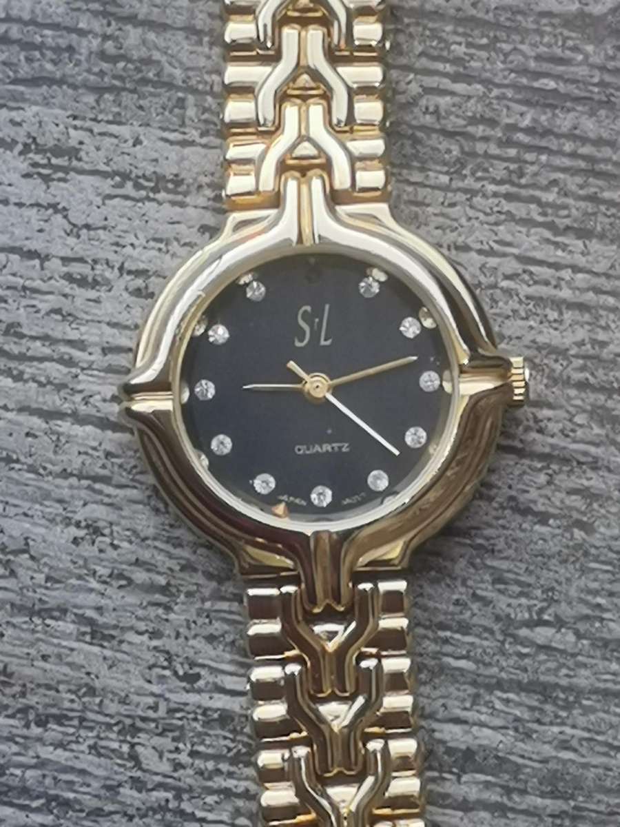 LADIES STL 18K GOLD PLATED WATCH IN EXCELLENT WORKING CONDITION