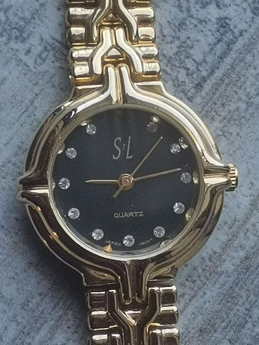 LADIES STL 18K GOLD PLATED WATCH IN EXCELLENT WORKING CONDITION