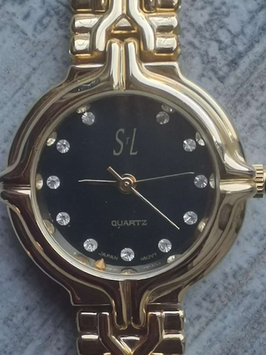 LADIES STL 18K GOLD PLATED WATCH IN EXCELLENT WORKING CONDITION