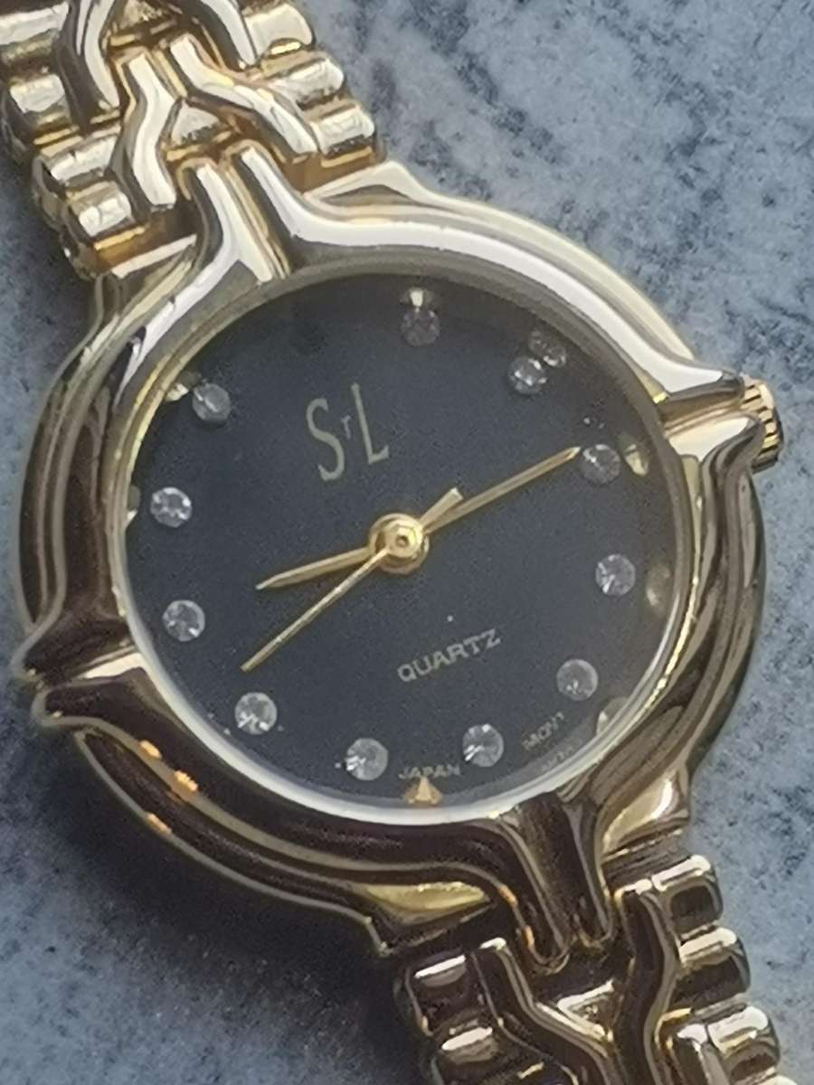 LADIES STL 18K GOLD PLATED WATCH IN EXCELLENT WORKING CONDITION