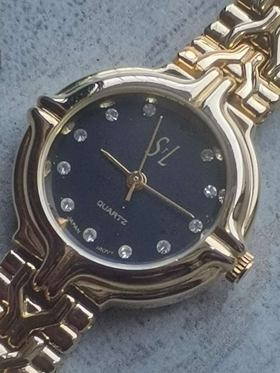 LADIES STL 18K GOLD PLATED WATCH IN EXCELLENT WORKING CONDITION